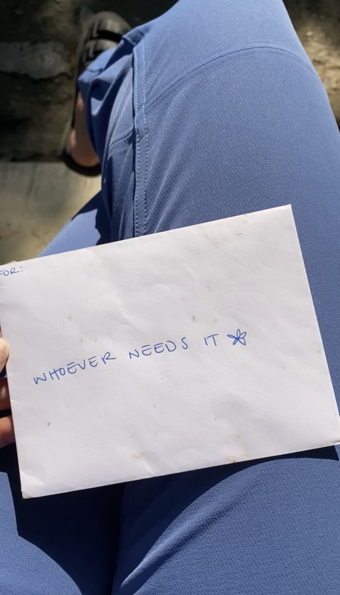 Envelope that reads "Whoever Needs It"
