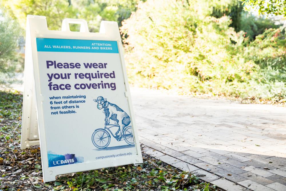 Wear a face covering sign